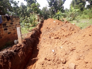 The excavated part where the perimeter wall fence will be erected.