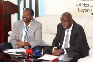 CAA MD Dr. David Kakuba (R) and Director Airports John Kagoro addressing the media on the progress of the various Entebbe Airport Expansion projects