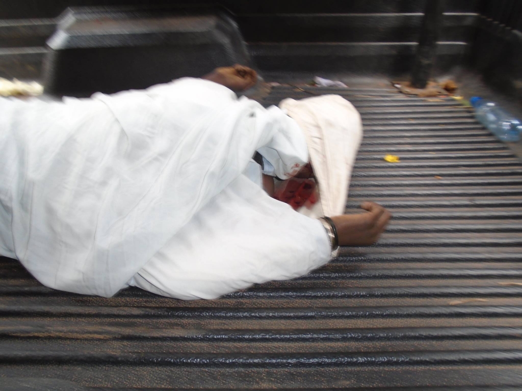 Aisha Kasowole's body on a police pick up. She was a known prostitute in Abaita Ababiiri. She was killed a few days ago.