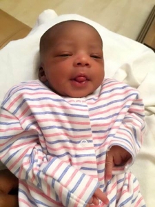 KAYLA AMBER KANYIKE Smiling like Daddy.