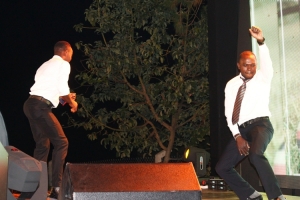 Kenya's Alfred Nandwa and Uganda's Mwanja Becca showcase their dancing skills.