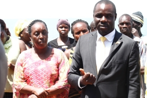 MP Tumusiime with Lower-Madi County in Arua District Ogama Alli Ismail addressing the Lugbara fishing community against illegal fishing.