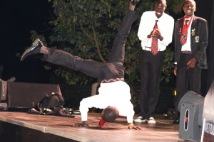 Uganda's Richard Baguma spinning head down during a dance competition.
