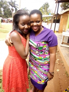 Councilor Esther Asiimwe with her baby sister Sarah Tusiime (L).