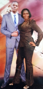 Jailed detective Steven Kitonsa with his wife recently