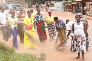 MP Tumusiime and other NRM Leaders participated in a cleaning exercise in Nsamizi.