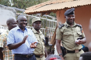 RPC Bakaleke (R) with Kitala LC1 Chairman Lamech Kasujja addressing the residents on Monday.
