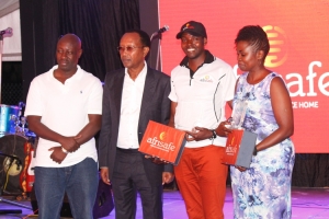 Chairman's Cup winners Lutajani Kemisi and Wendy Angudeyo with Afrisafe Chairman Nkwame Ejalu and Amos Nzei.