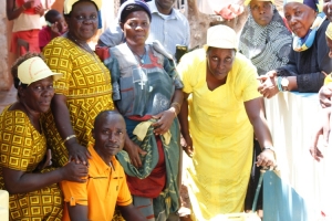 MP Tumusiime with the local leaders during the official launch of the public stand pipes on Saturday.