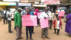 Meddie Bawonga (right) led the demos in Entebbe on Wednesday.