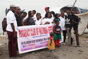 Rotaract Club Of Nkumba Stewards pose for a photo at the Kimmi Island.