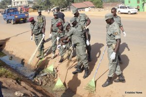 SFC Soldiers in a cleaning exercise at Abaita Ababiiri on Saturday. 