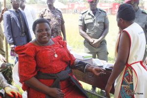 RDC Kirabira checks her pressure levels shortly after launching the Tarehe Sita week at Comprehensive S.S on Saturday.