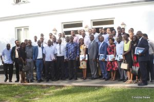 UGATCA Members pose for a group photo with the patron Capt. Mike Mukula.