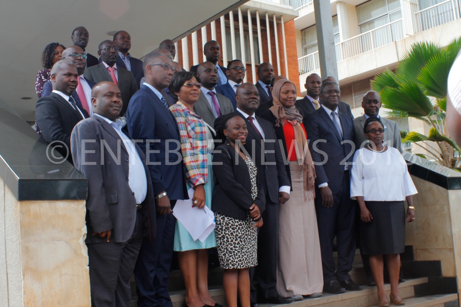 East Africa Moves Towards Creation Of Single Satellite-Based Aviation System. Hon. Aggrey Bagiire, State Minister For Transport (4th from right) poses for a group photo with the participants at Sheraton Hotel on Tuesday.