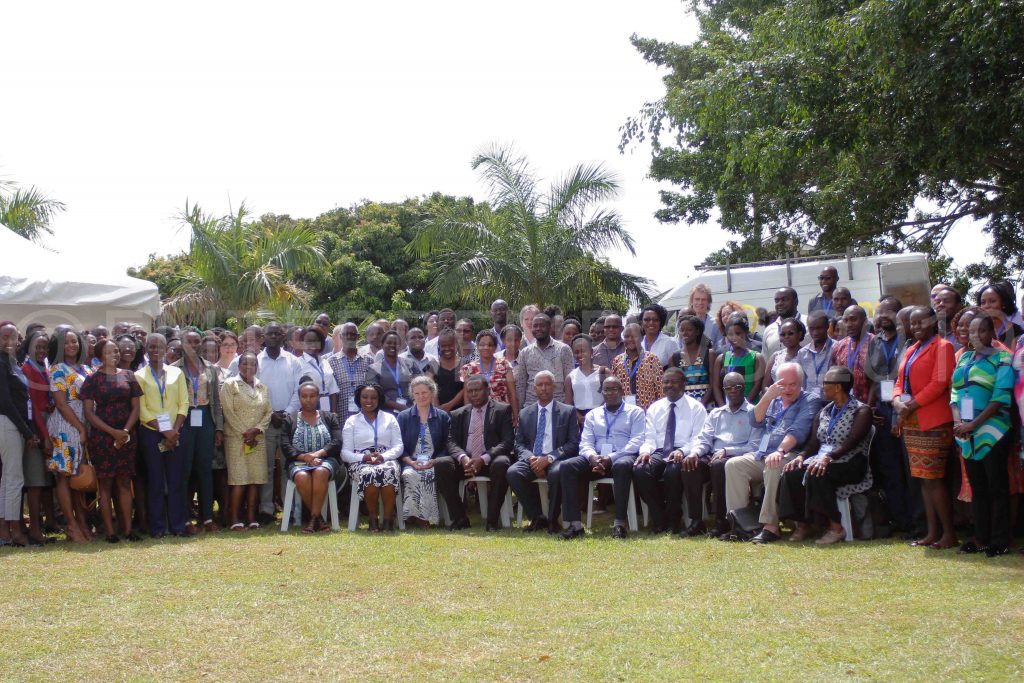WHO Rallies Researchers To Fast Track Uganda’s Health SDGs. UVRI Staff and other participants pose for a group photo.