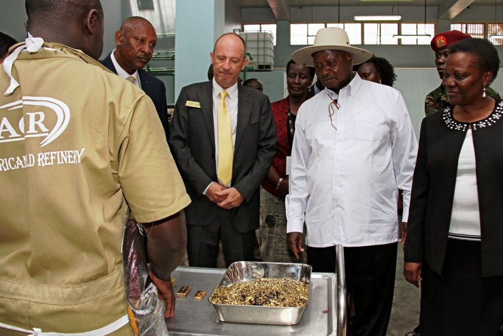 Ugandan President Yoweri Museveni, in white, with Alain Goetz and gold flakes at AGR in 2017. Photo: GAEL GRILHOT/Agence France-Presse/Getty Images