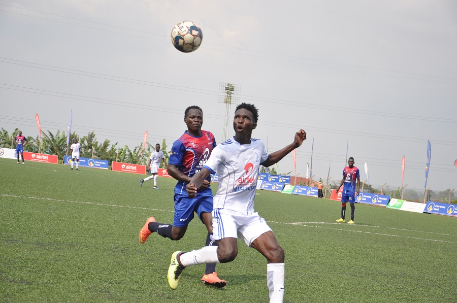 Buddu to battle it out against Gomba in the Airtel Masaza Cup Finals Titus Ssematimba is closed down by Bulemeezi's Douglas Kizza Lule