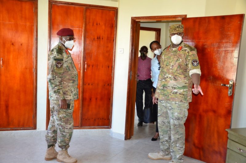 Lt Gen Muhoozi (right) launching new SFC structures in Entebbe this Friday