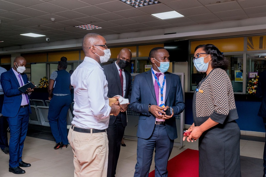 HFB ED Peace Kabunga (extreme right) interacts with a customer during the Customer Service Week
