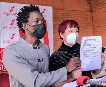 Lawyer Ssemakadde and Mrs. Wang Yong Jie