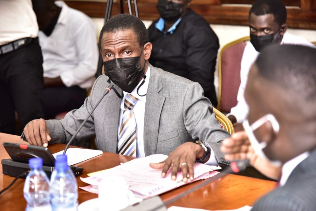 The Attorney General, Kiryowa Kiwanuka, appearing before the committee.