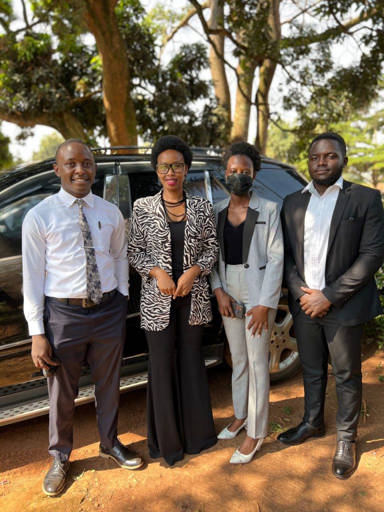 Barbie Kyagulanyi with some of the event's oragnisers awaiting entry into UCU