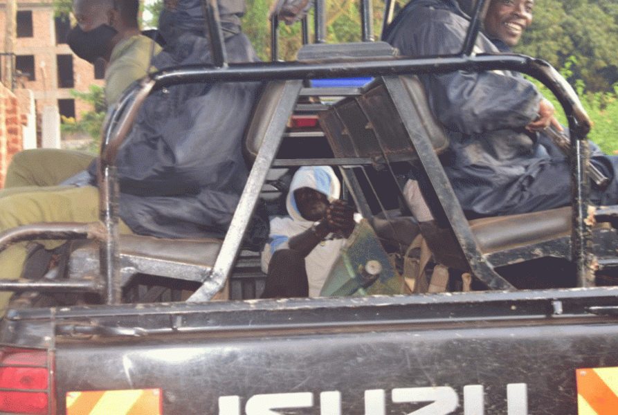 Laurent Nkurunzinza, the lead-suspect in the murder of Laurent Nkurunzinza is driven away from the crime scene on a police vehicle on June 23, 2022. PHOTO/ENTEBBE MEDIA LAB 