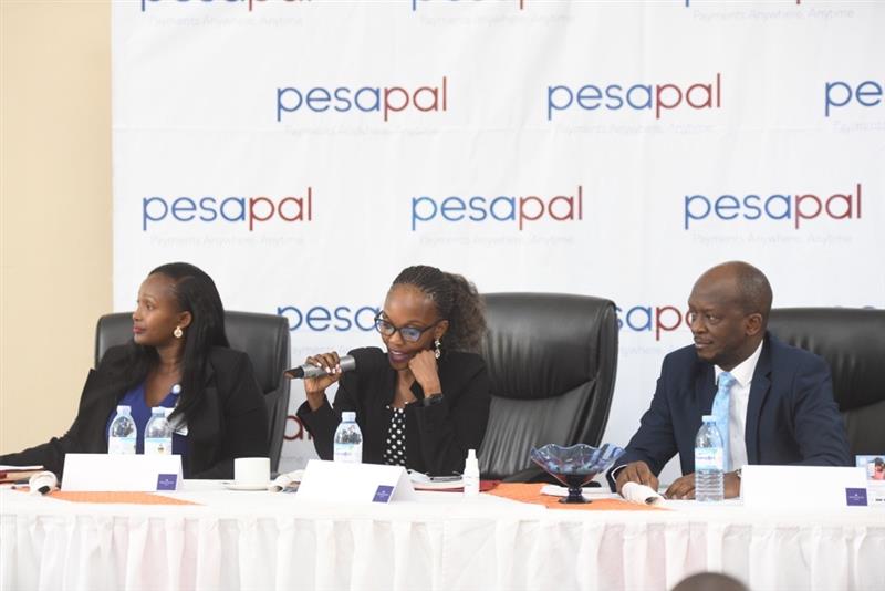 LR - Maureen Njoroge, Pesapal Ag. Country Manager, Jean Byamugisha, Executive Director, UHOA and Martin Barungi, Pesapal Country Director.