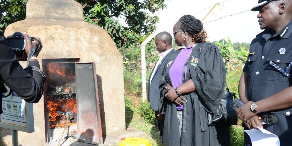 Officials during the burning of the narcotic drugs on November 10, 2023. PHOTO/ POLICE