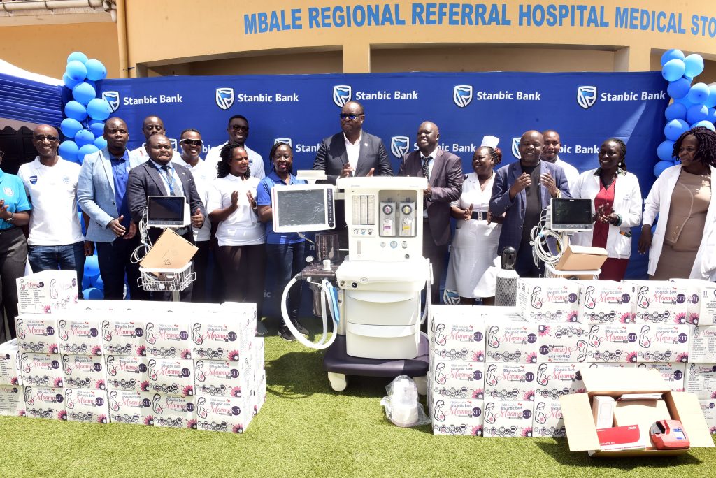 Stanbic Bank’s UGX 100m Donation to Mbale Hospital Brings Hope for Women, Children In Elgon Region Stanbic Bank delegation led by Chief Executive Mumba Kalifungwa (C) handing over Medical equipment to Mbale Hospital leadership and RCC Hamza Banja