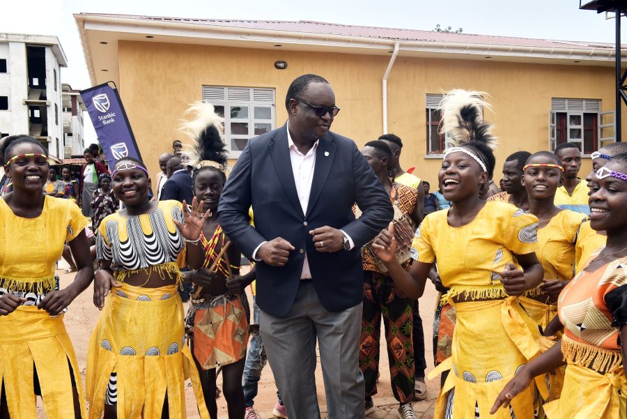 Traditional Dancers welcome Mumba Kalifungwa, the Stanbic Bank Chief Execuitive with Kadodi dance at Mbale referral Hospital in Mbale City