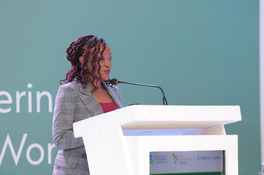 Margaret Kigozi the Head Corporate Affairs Brand and Marketing at Stanchart speaking